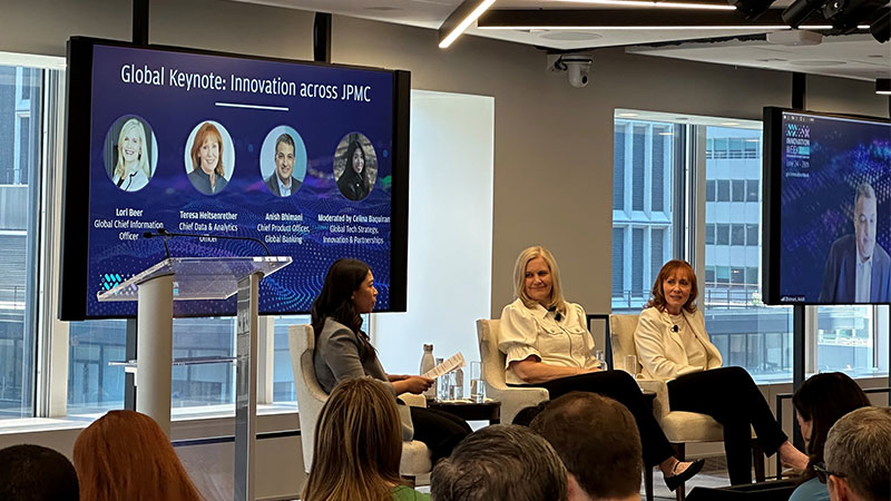 Panel discussion at JPMC event titled 'Global Keynote: Innovation across JPMC'. The panel includes Lori Beer, Global Chief Information Officer; Teresa Heitsenrether, Chief Data & Analytics Officer; Anish Bhimani, Chief Product Officer, Global Banking; and is moderated by Celina Biguiani, Global Tech Strategy, Innovation & Partnerships