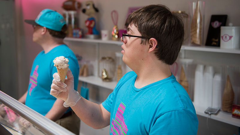 Employee holding ice-cream