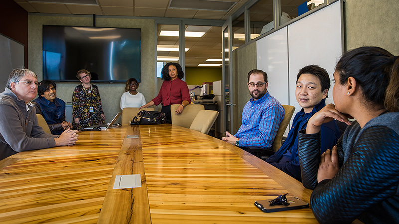 The Detroit Service Corps team meets with staff members of Southwest Solutions’ ProsperUS Detroit program.